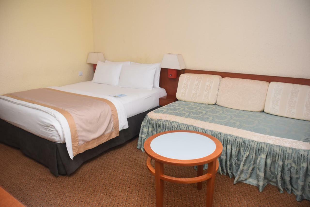 Hotel Sawa Дуала Екстериор снимка